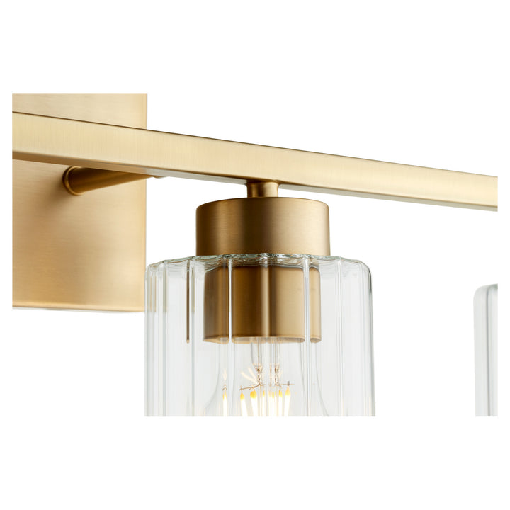 Quorum Ladin 501-4-280 Bath Vanity Light 30 in. wide - Aged Brass W/ Clear Fluted Glass