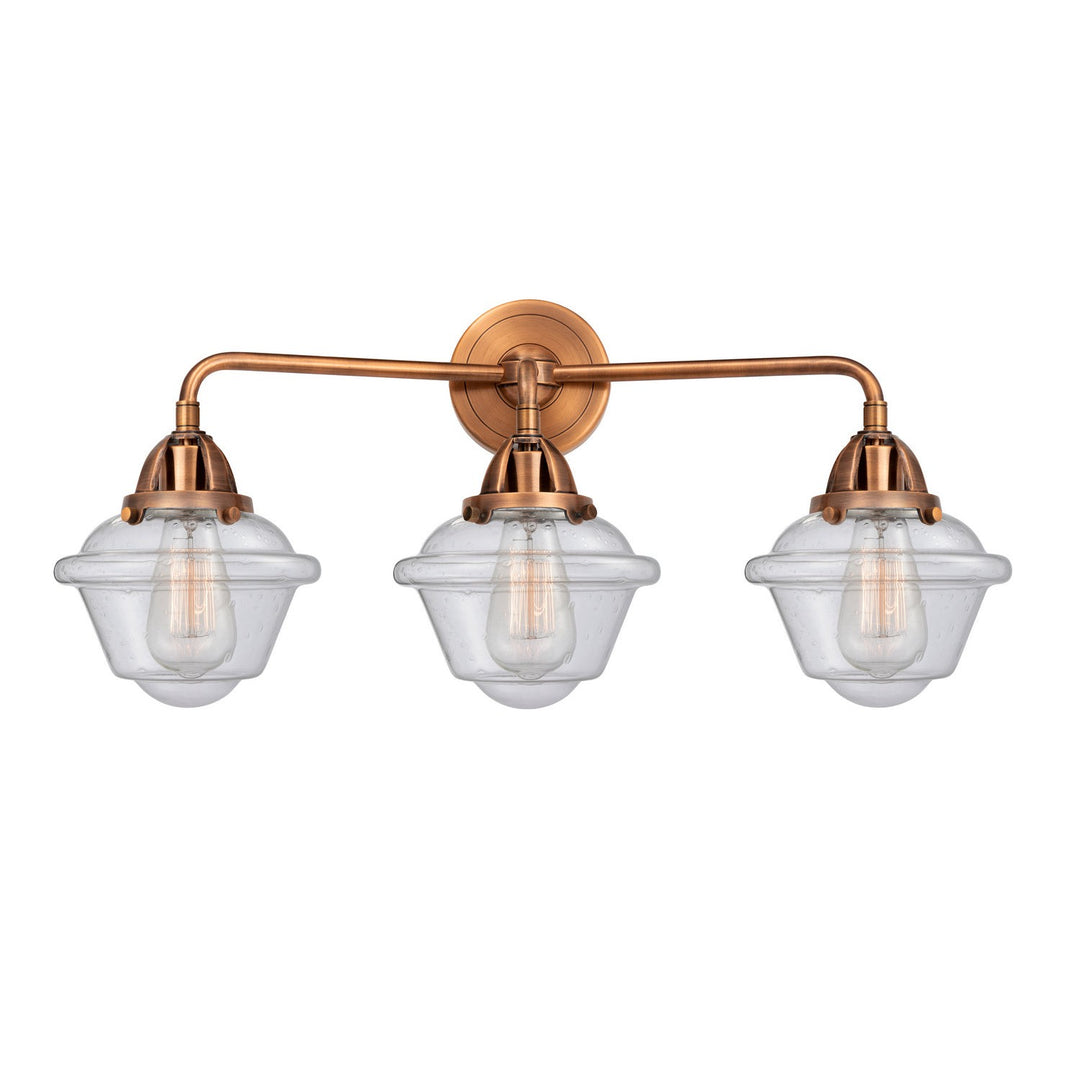 Innovations Nouveau 2 288-3W-AC-G534 Bath Vanity Light 26 in. wide - Antique Copper