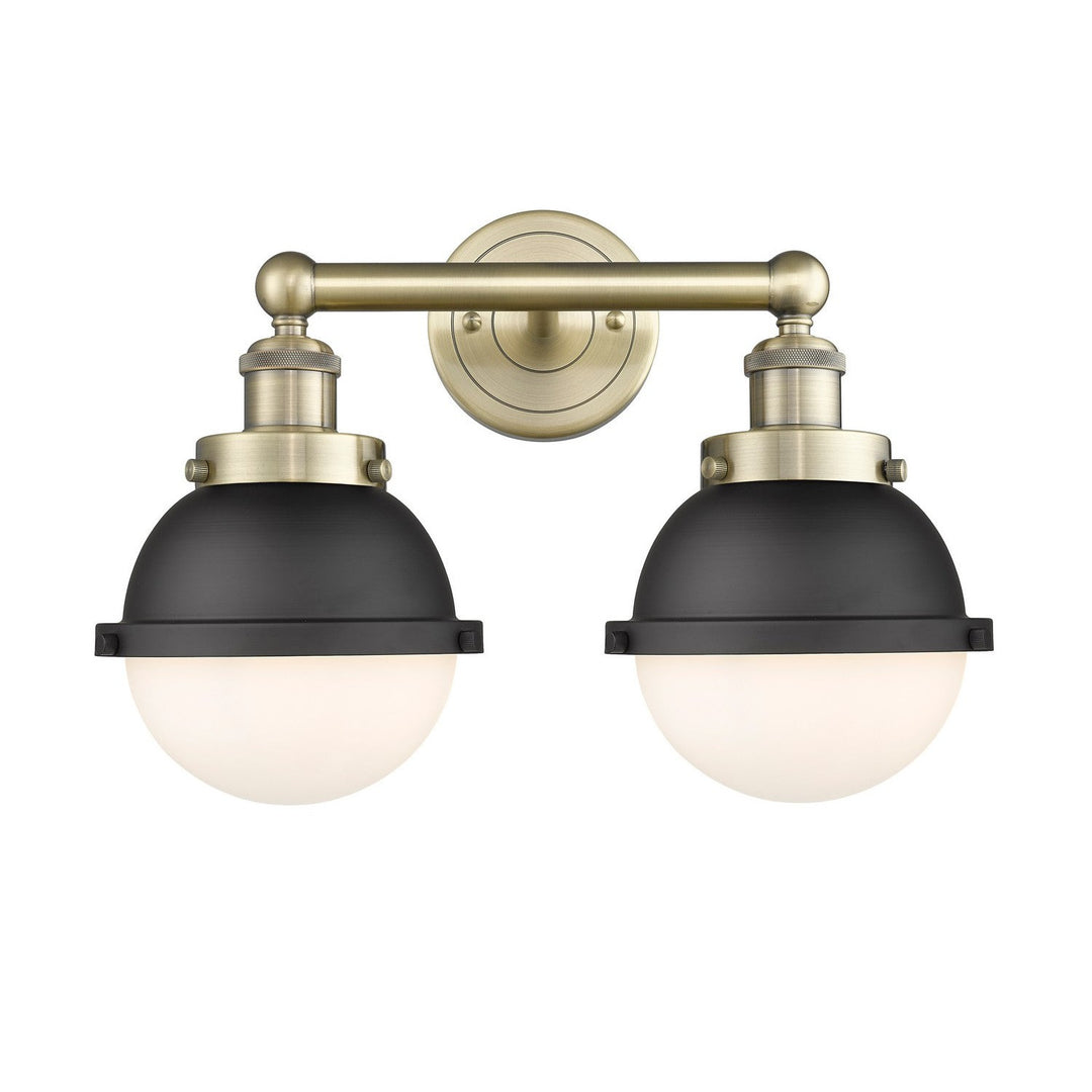 Innovations Downtown Urban 616-2W-AB-HFS-61-BK Bath Vanity Light 17 in. wide - Antique Brass