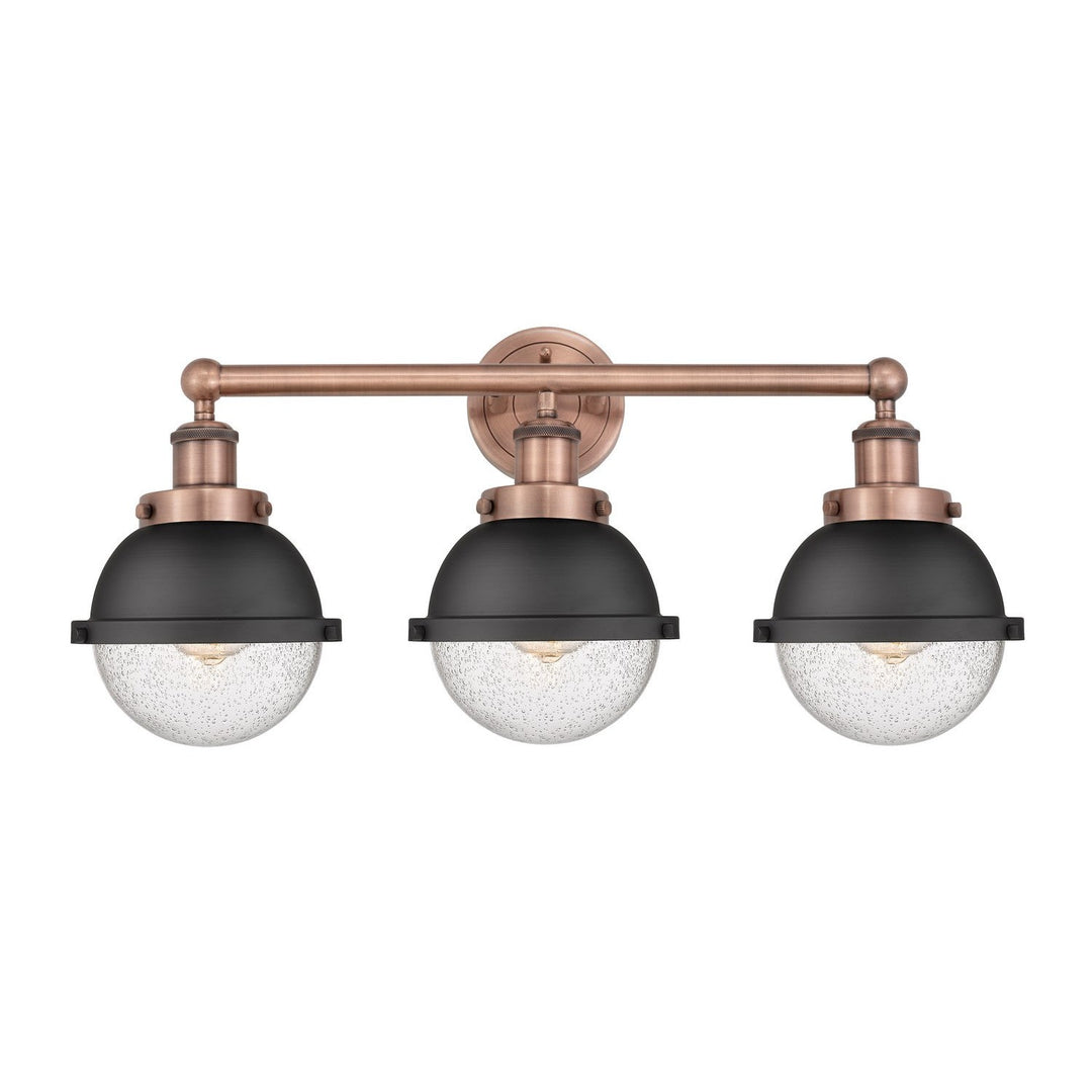 Innovations Downtown Urban 616-3W-AC-HFS-64-BK Bath Vanity Light 26 in. wide - Antique Copper