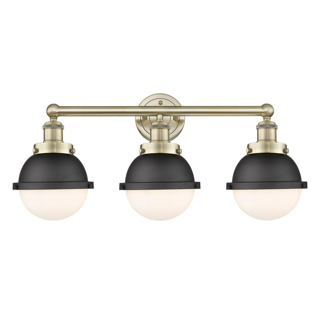 Innovations Downtown Urban 616-3W-AB-HFS-61-BK Bath Vanity Light 26 in. wide - Antique Brass