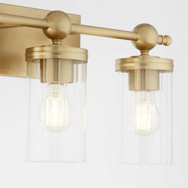 Quorum Lee Boulevard by Tamara Day 560-3-80 Bath Vanity Light 22 in. wide - Aged Brass