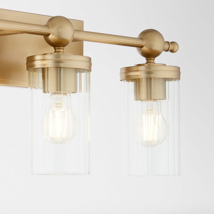Quorum Lee Boulevard by Tamara Day 560-3-80 Bath Vanity Light 22 in. wide - Aged Brass